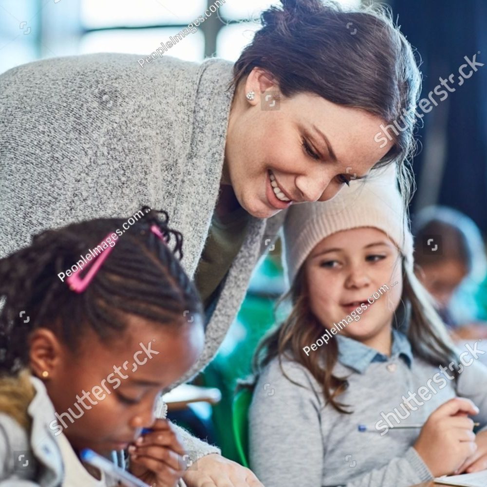 stock-photo-teacher-learning-and-help-children-in-class-writing-in-notebook-for-education-studying-or-2475803051
